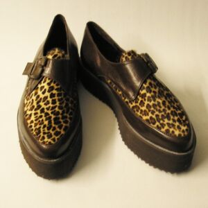 Piccolo piel leopardo marrón