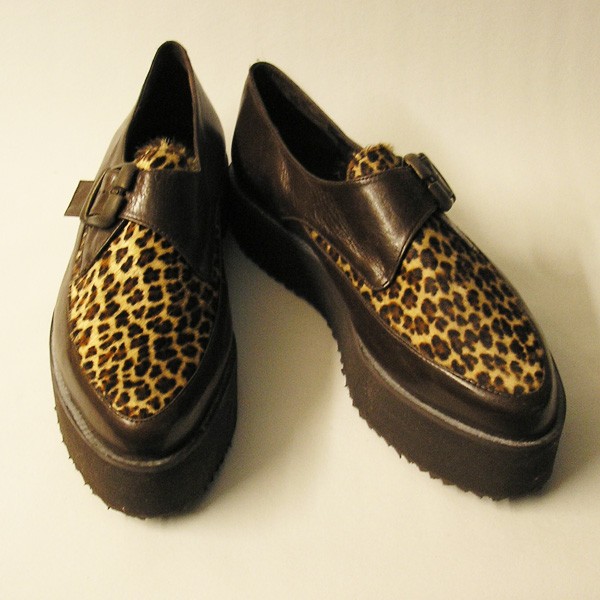 Piccolo piel leopardo marrón